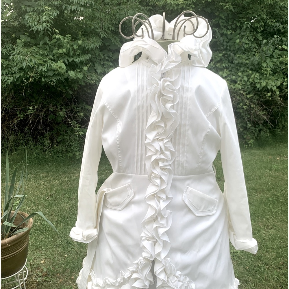 Classy white rain coat-size M. By Samuel Dong.